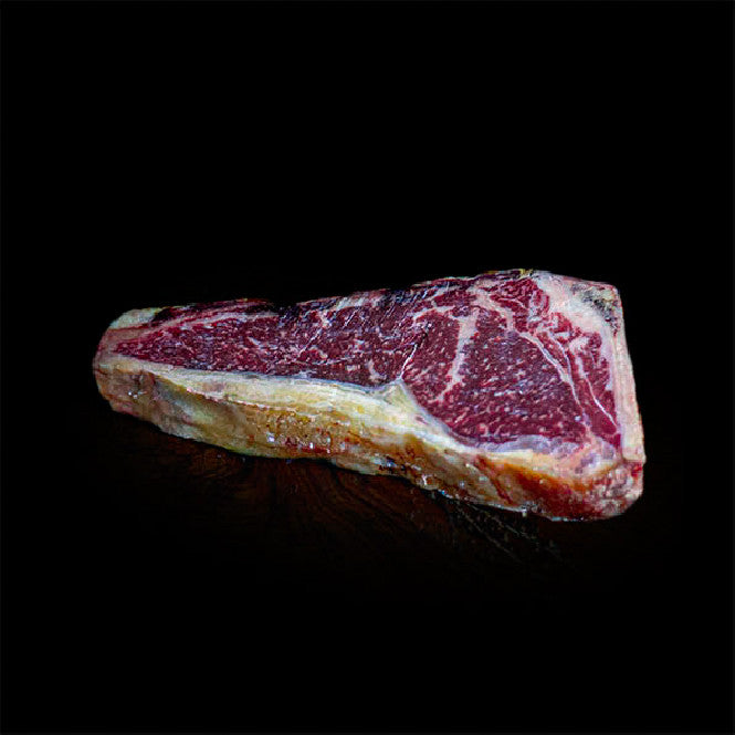 Rumpsteak mit Knochen | Striploin Bone In | Premium Dry Aged aus Spanien | VACUM